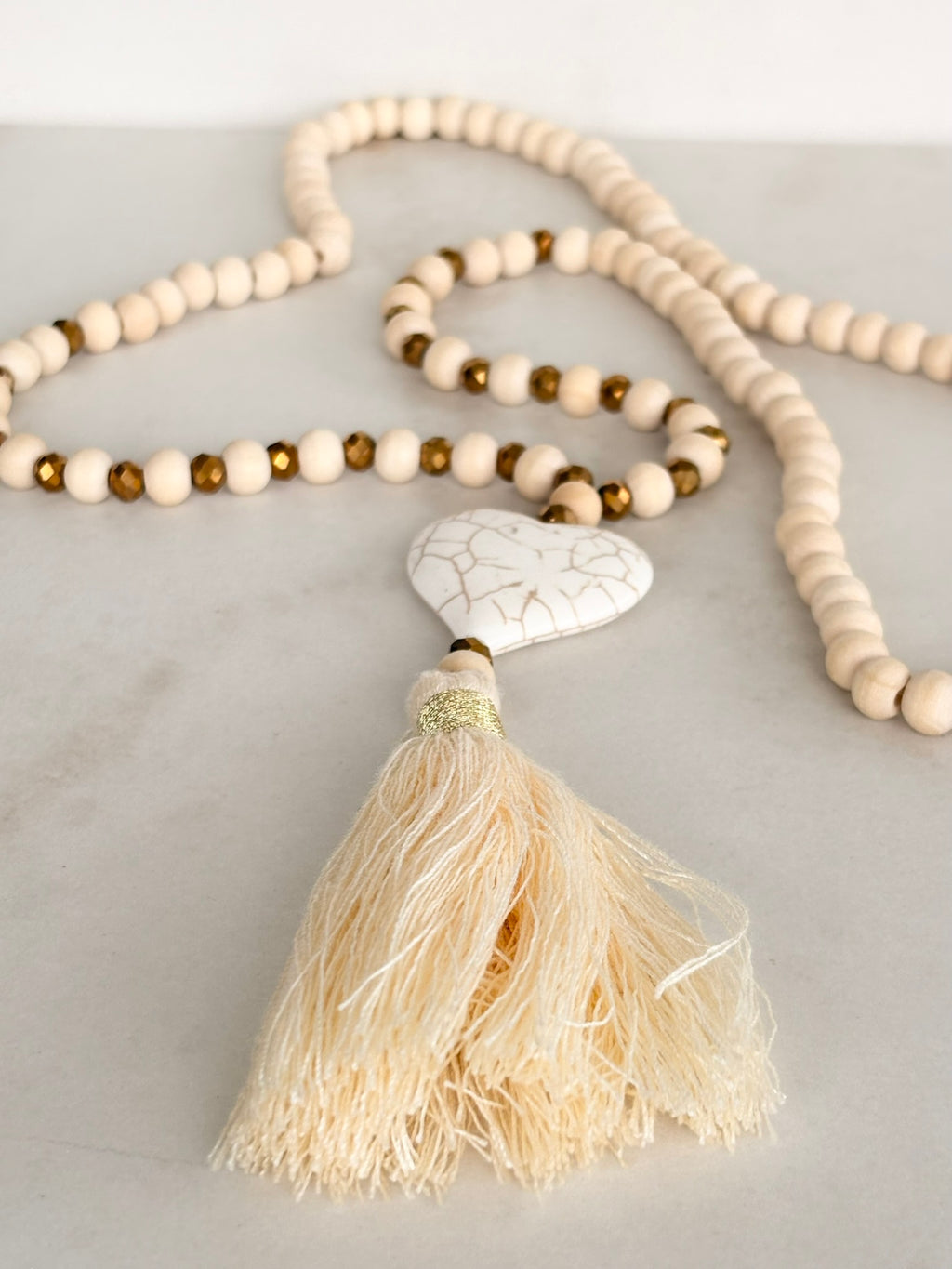 White Wood Bead Necklace with Heart Pendant and Tassel
