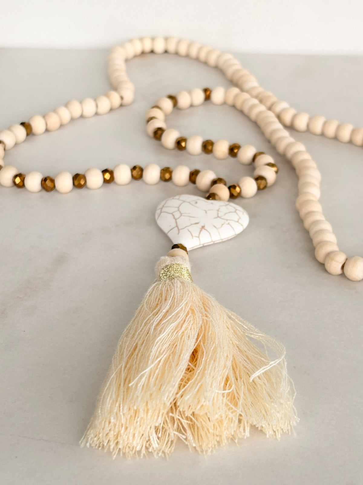 White Wood Bead Necklace with Heart Pendant and Tassel