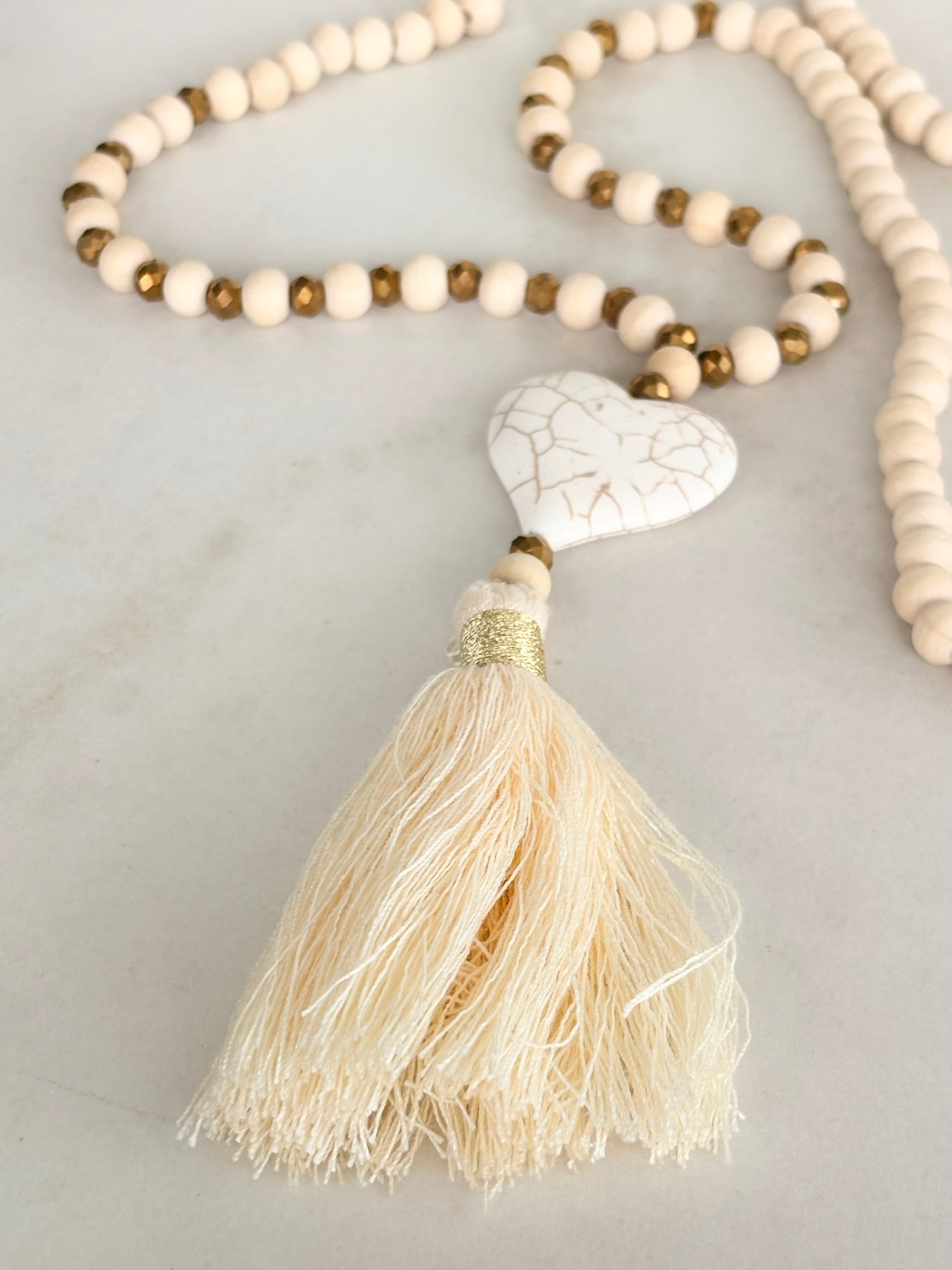 White Wood Bead Necklace with Heart Pendant and Tassel