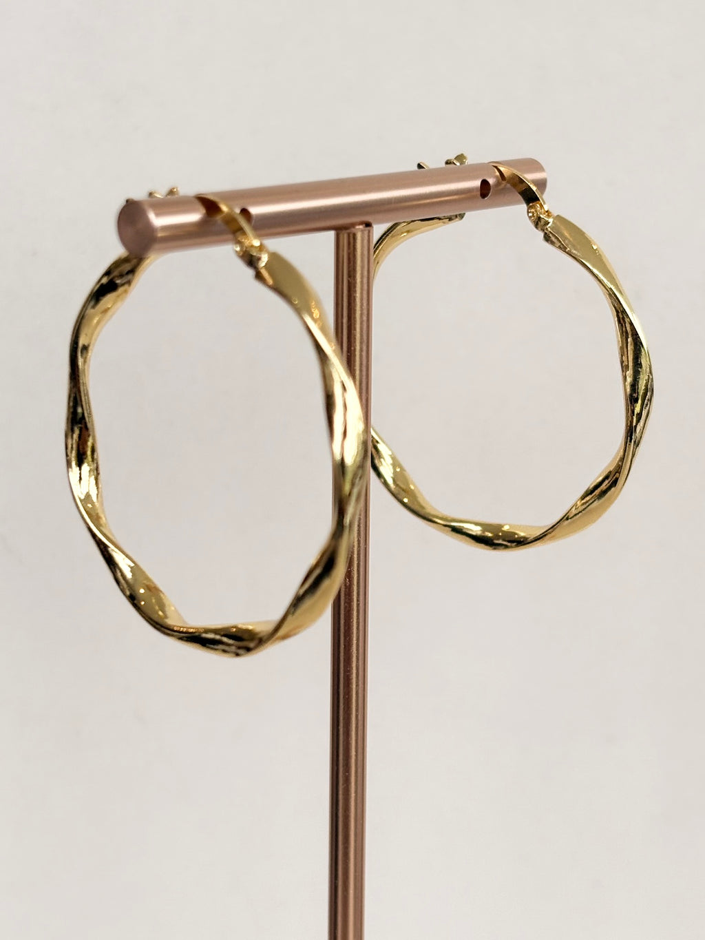 Gold Twisted Wave Hoop Earrings