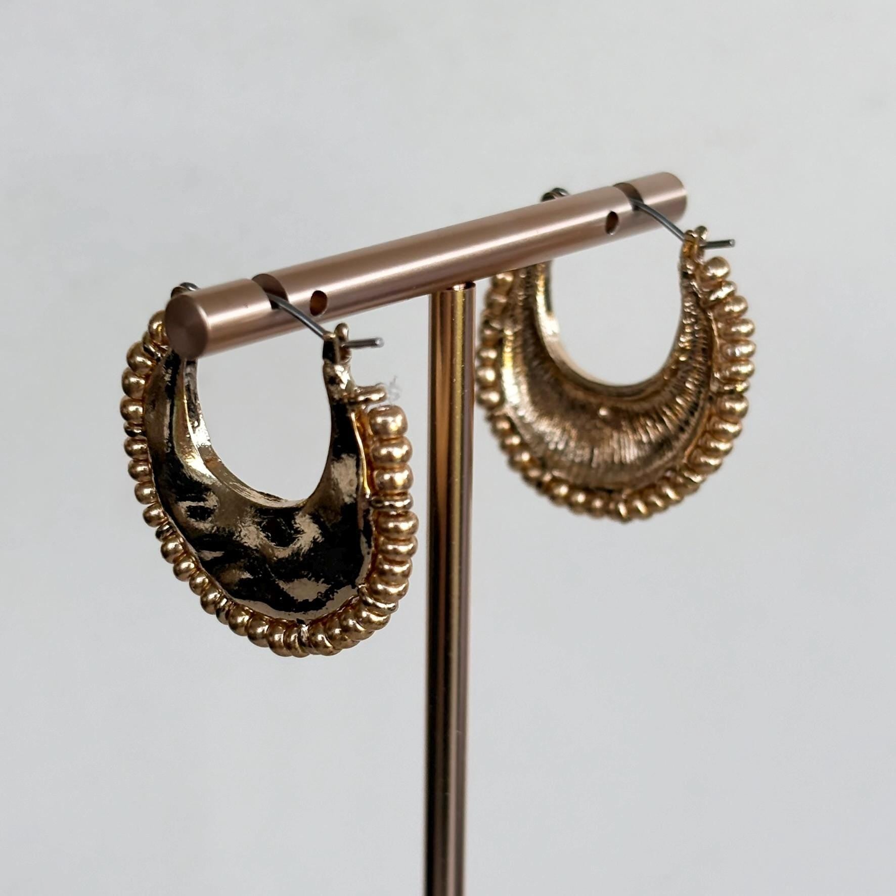 Hammered Gold Crescent Hoop Earrings with decorative fringed edge