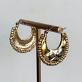 Hammered Gold Crescent Hoop Earrings with decorative fringed edge
