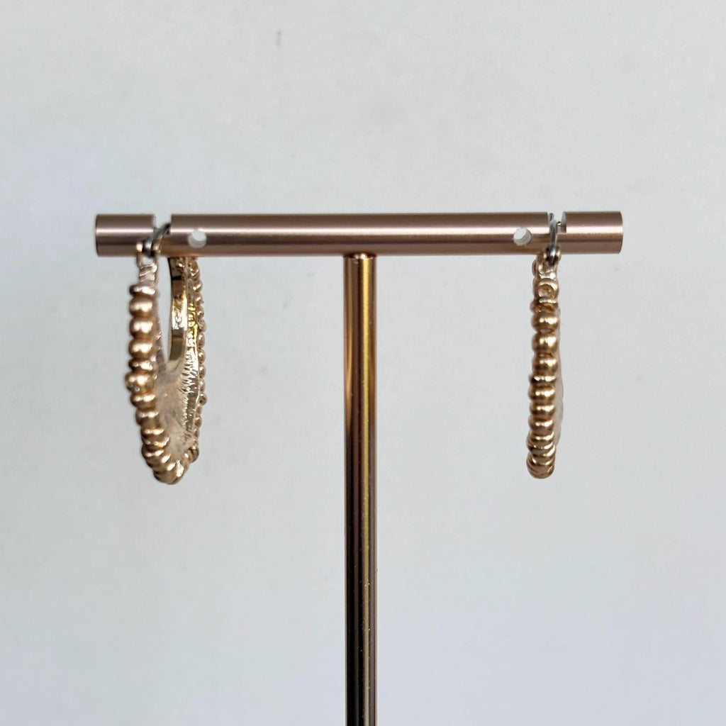 Hammered Gold Crescent Hoop Earrings with decorative fringed edge
