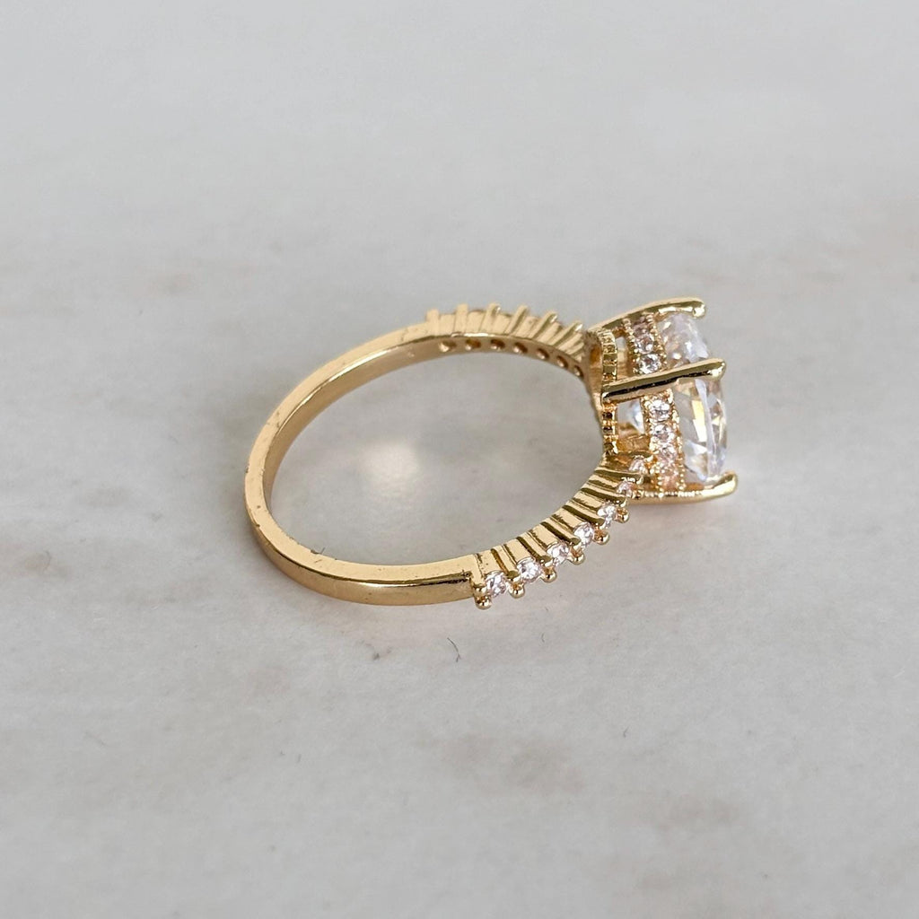 Gold Oval Zircon Solitaire Pave Shoulders Ring