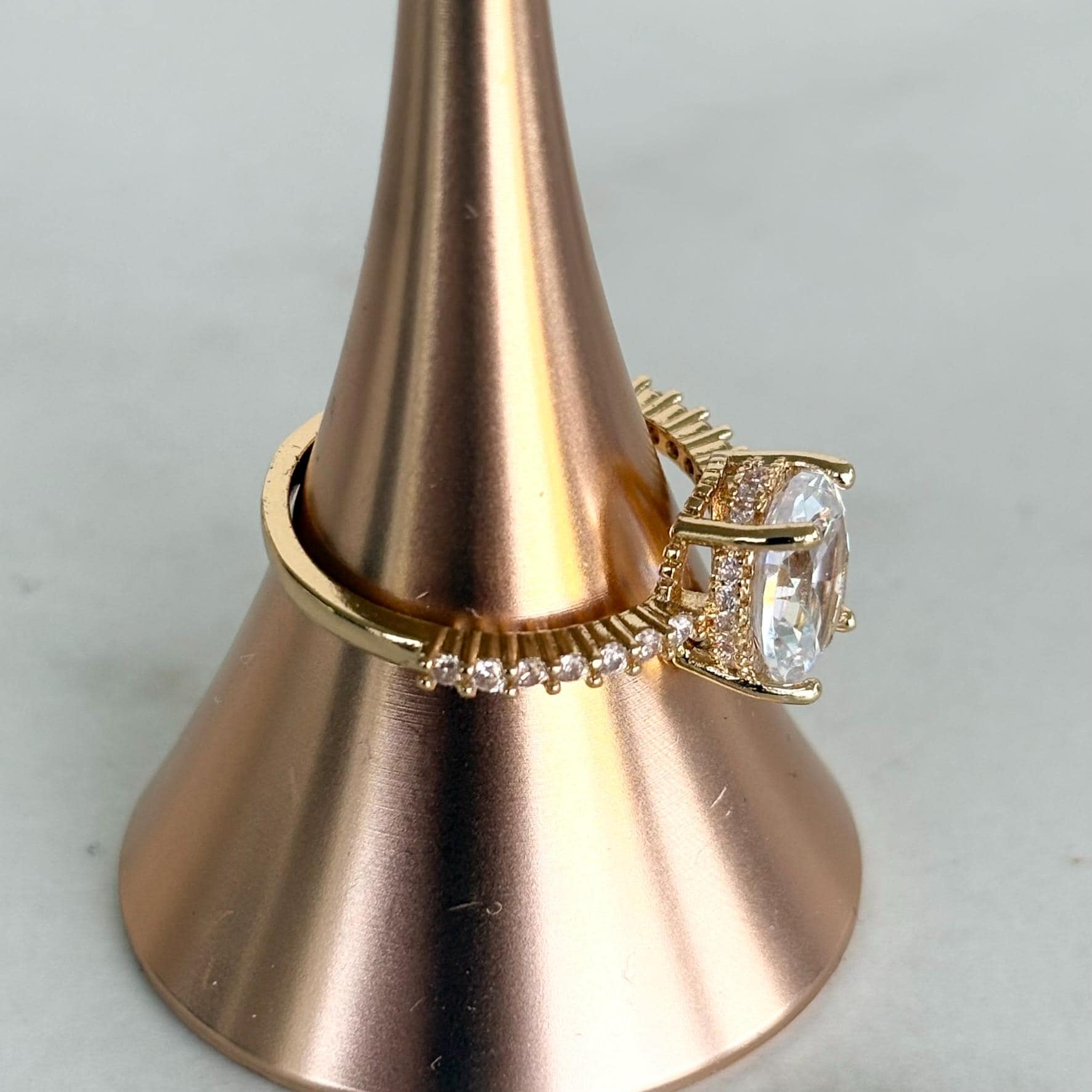 Gold Oval Zircon Solitaire Pave Shoulders Ring